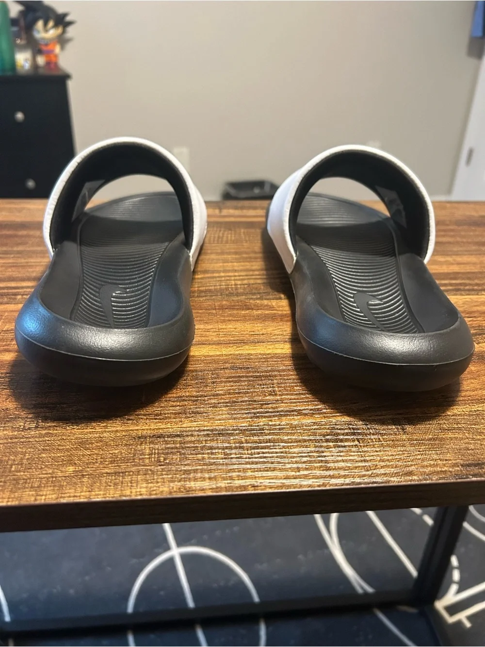 Nike Black and White Slide Sandals with Logo Strap